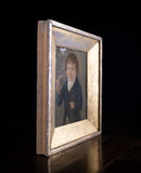 Early 19th Century Boy With Bird (American School)