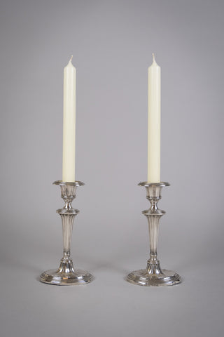 Pair Of Sterling Silver Neoclassical Candlesticks by Charles Boyton & Sons, 1911. - Harrington Antiques
