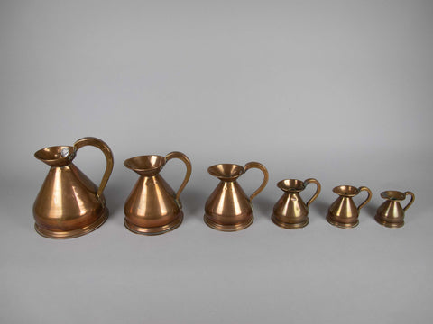 Six Graduated Vintage Copper Imperial Measuring Jugs. - Harrington Antiques